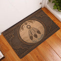 American Native dreamcatcher doormat displayed at an interior doorway on a wood floor