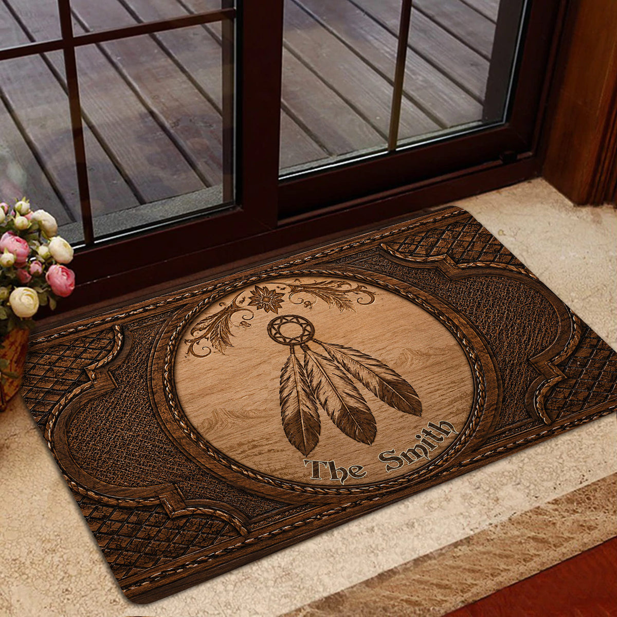 American Native dreamcatcher doormat styled inside a glass entry door with warm home decor