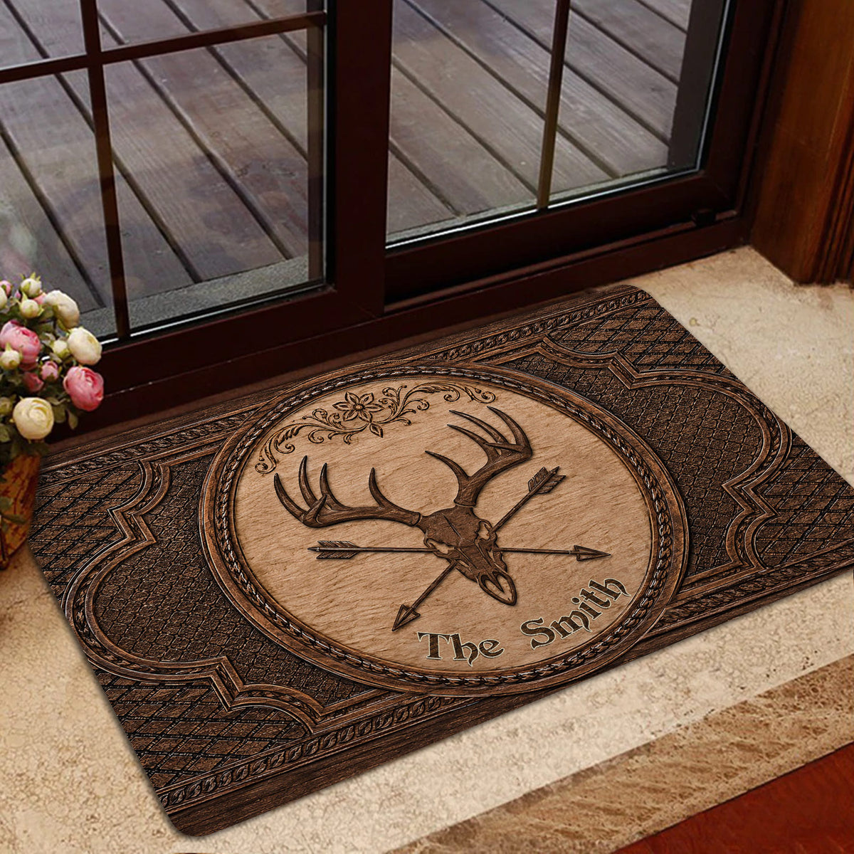Hunting-themed deer skull doormat styled in an indoor entryway beside a glass door