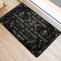Black occult Wicca door mat positioned beside a light-colored interior doorway