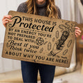 Wicca doormat shown in hand with bold protective message, crystals, pentagram, and smoke bundle illustration