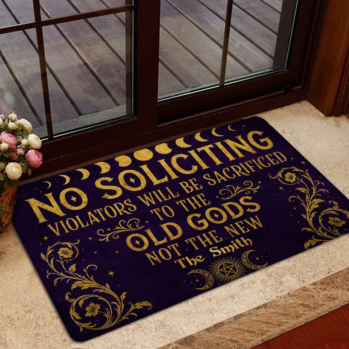 Wicca entryway mat shown near a glass door with dark purple and gold mystical artwork