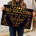 Wicca doormat held indoors, featuring gold moon phases, ornate flowers, and pentagram artwork
