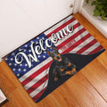 Patriotic Doberman entryway mat displayed on a wood floor beside a white door