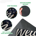 Dachshund doormat detail showing the printed surface, rubber backing and easy-clean construction