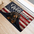 Dachshund welcome mat styled at an indoor doorway with a stars and stripes background