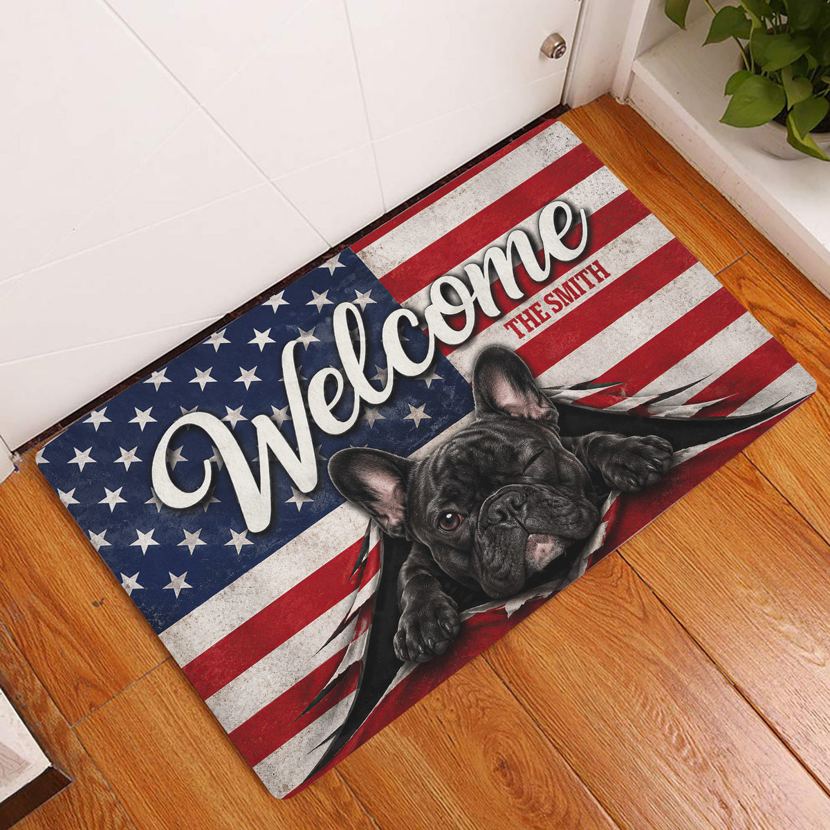 French Bulldog welcome mat displayed at an entryway on a warm wood floor