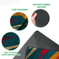 Rock and roll doormat detail showing the printed lightning bolt design, textured top, and rubber backing