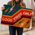Rock and roll doormat shown in a lifestyle presentation with vibrant lightning bolt graphics