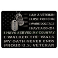 Black veteran doormat with dog tags, American flag artwork, and bold patriotic tribute lettering