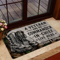 Veteran tribute rug shown inside a home entrance with combat boots, dog tags, and woodland camouflage design