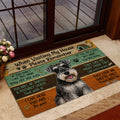 Miniature Schnauzer doormat displayed by a glass door in a warm home entrance