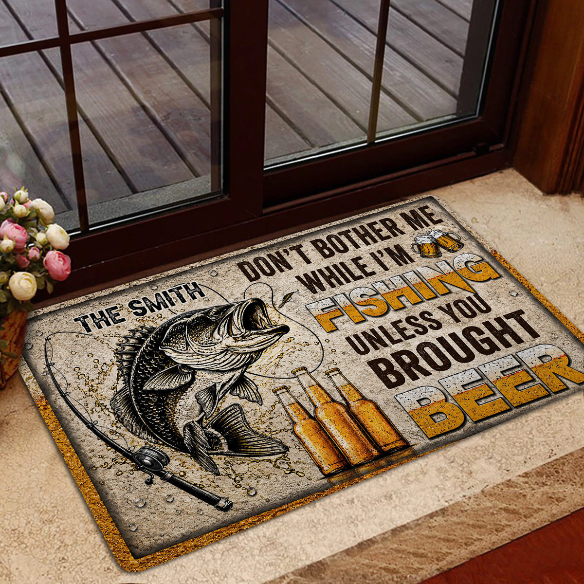 Fishing and beer doormat styled at a home entrance with a glass door and wood threshold