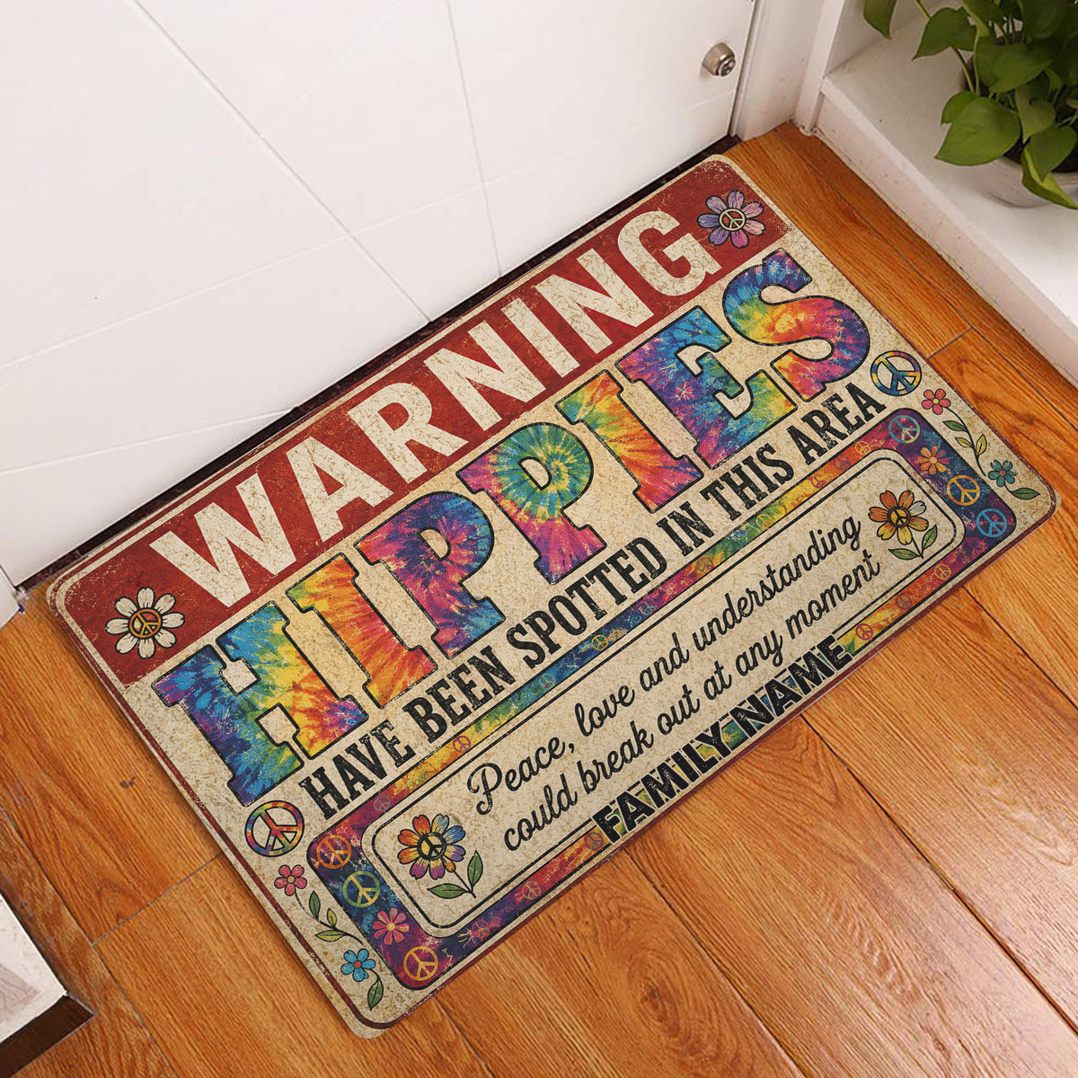Hippie peace-and-love doormat displayed in a bright indoor entryway beside a white door