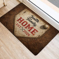 Vintage baseball home plate doormat positioned beside a doorway on light wood flooring
