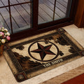 Cowboy-themed entryway mat shown by a glass door with a large western star and rustic ranch-style artwork