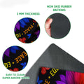 Close-up view of the LGBT pride doormat showing its colorful printed surface and dark rubber backing