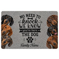 Dachshund doormat with realistic black, brown, and red dogs surrounding a playful welcome message