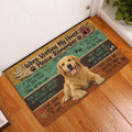 Golden Retriever entryway rug displayed by a white door on hardwood flooring with rustic colorful artwork