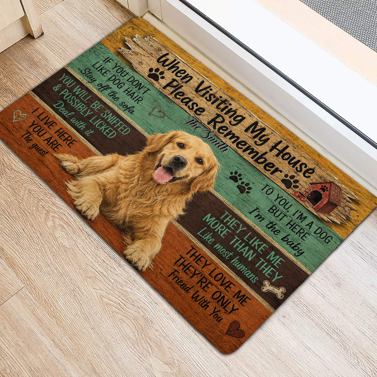 Golden Retriever door mat styled at a home entrance with wood-look artwork, paw prints, and pet message