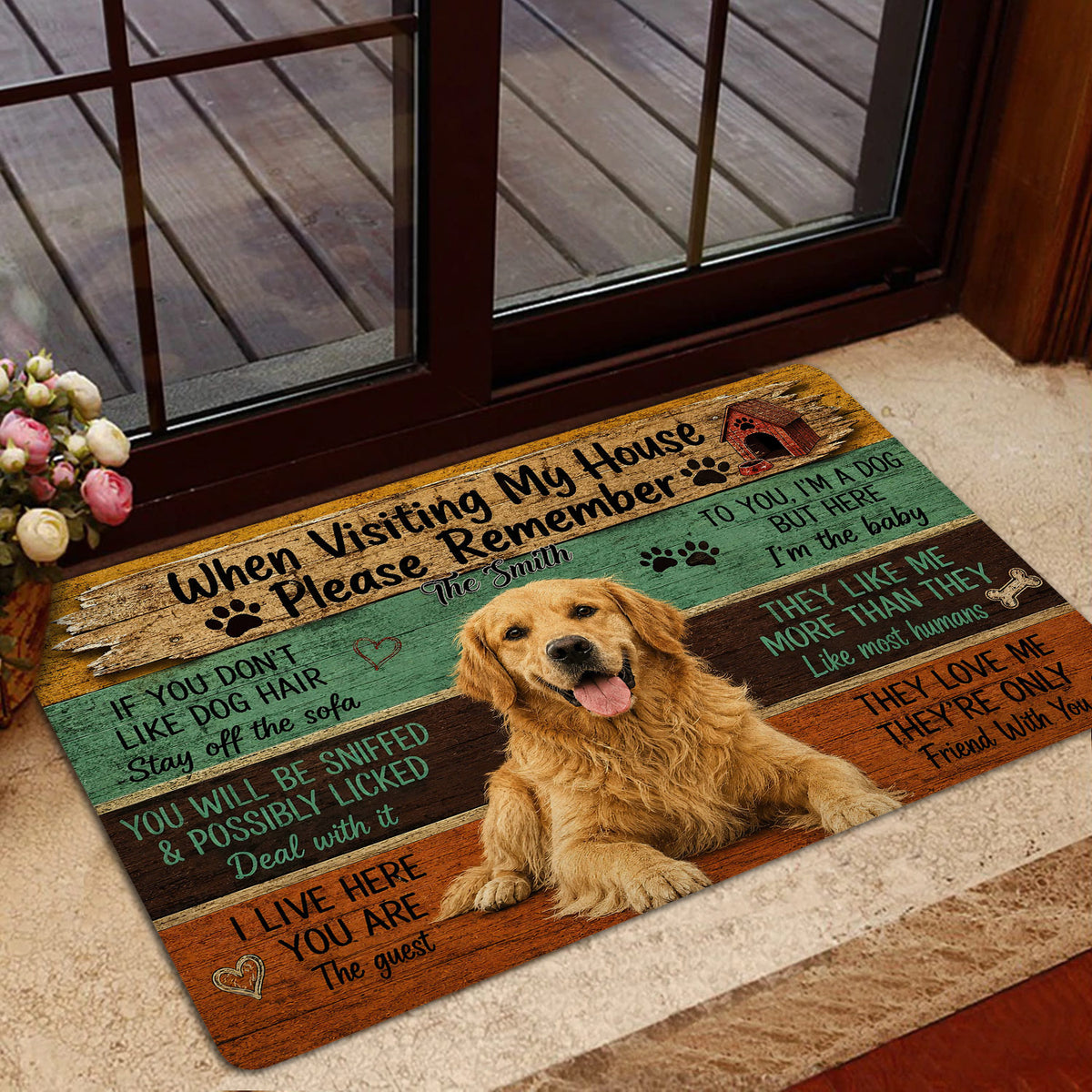 Golden Retriever welcome mat shown near a glass door with rustic artwork and a cheerful dog portrait
