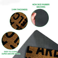 Close-up of LGBT pride doormat showing printed surface, rubber backing, and feature details