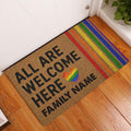 LGBT pride doormat displayed at a home entrance with rainbow stripes and welcoming artwork