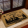 Camping rug styled inside a home entrance with travel trailer, mountain and campfire artwork