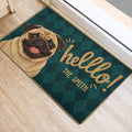 Pug entryway rug with playful welcome lettering positioned beside a bright doorway