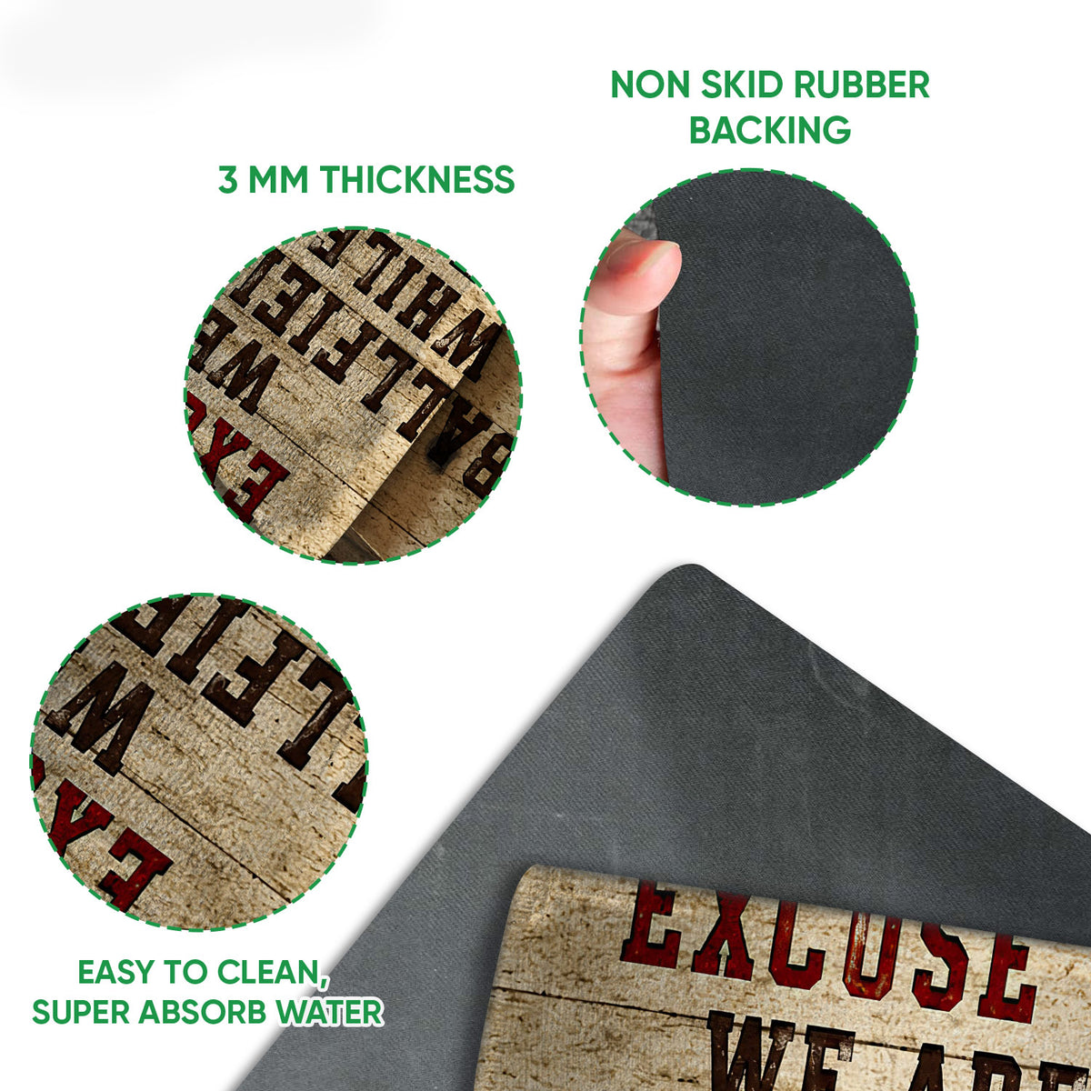 Close-up detail of the baseball doormat print and dark rubber backing with traction-focused construction