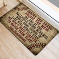 Baseball entryway mat positioned beside a doorway, featuring weathered wood styling and red stitching details