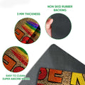 Close-up of colorful LGBT doormat artwork with printed felt surface and rubber backing detail