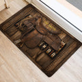 Rustic cowboy saddle and rope doormat placed near a bright home entrance