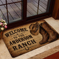 Cowboy ranch welcome doormat displayed inside a glass entry door with rustic Western decor
