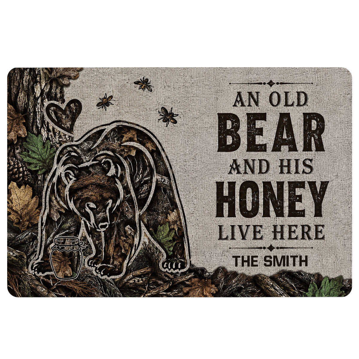 Bear doormat featuring a woodland illustration, honey jar, bees, autumn leaves, and rustic entryway lettering