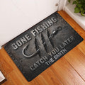 Fishing doormat displayed at an indoor entryway on a wood floor beside a white door