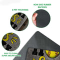 Softball doormat detail showing the printed felt surface, rubber backing, and rolled edge construction