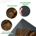 Close-up of cowboy doormat artwork and rubber backing with traction-focused construction details
