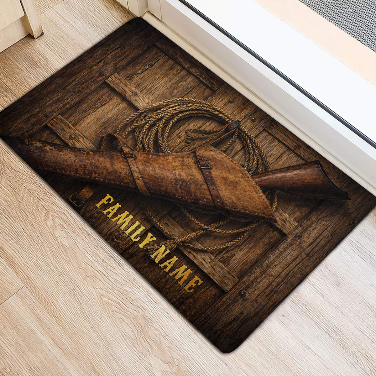 Western cowboy door mat placed by a doorway, featuring a rifle, leather gear and rope
