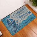 Blue mermaid entryway rug displayed by a white door on a wood floor
