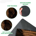 Close-up detail of cowboy doormat artwork and black rubber backing with easy-clean construction