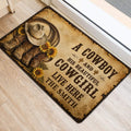 Rustic cowboy doormat placed inside an entryway, showing cowboy boots, hat, sunflowers, and western lettering