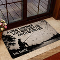 Fishing entryway rug shown by a glass door with an angler lake scene and rustic outdoor artwork