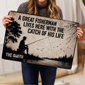 Fishing doormat held indoors, showing a silhouetted fisherman casting across a lake with trees and birds
