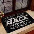 Racing welcome mat displayed in a home entrance with bold typography, stars, and checkered details