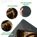Close-up of the cowboy doormat's textured Western artwork and dark rubber backing