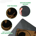 Doormat detail view showing cowboy horse artwork, textured top surface, and dark rubber backing