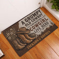 Cowboy-themed doormat displayed at an indoor doorway on a warm wood floor