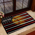 Softball door mat in a home entryway featuring colorful bats, a glove, stars, and dark artwork