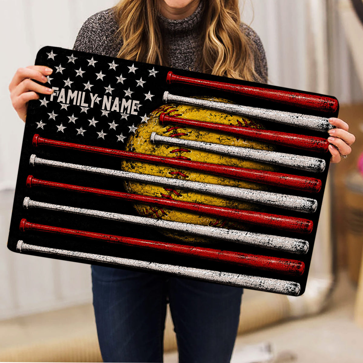 Softball doormat held indoors showing the full bats, glove, stars, and black background design